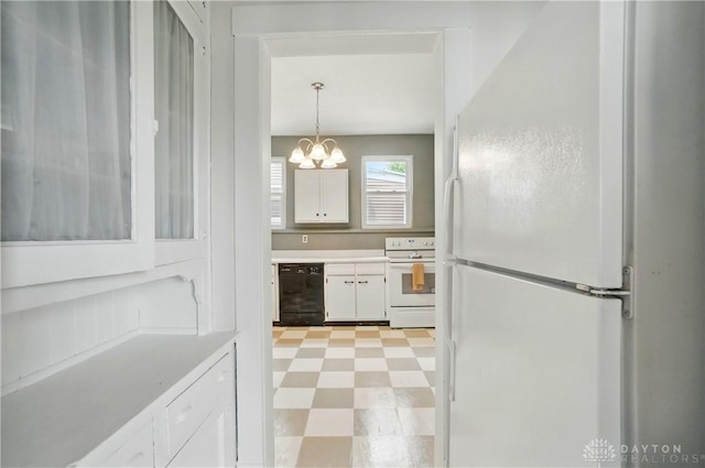 2344 Quatman Ave, Norwood, OH 45212 - kitchen featuring white appliances, white cabinetry, a chandelier, and light countertops