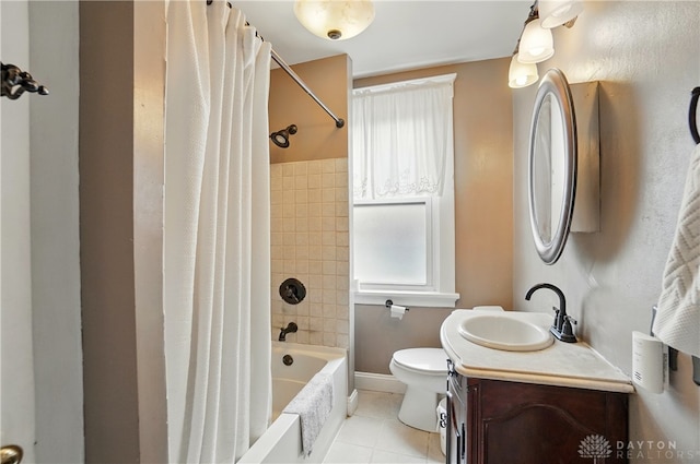 2344 Quatman Ave, Norwood, OH 45212 - bathroom with vanity, healthy amount of natural light, shower / bath combo with shower curtain, and tile patterned floors