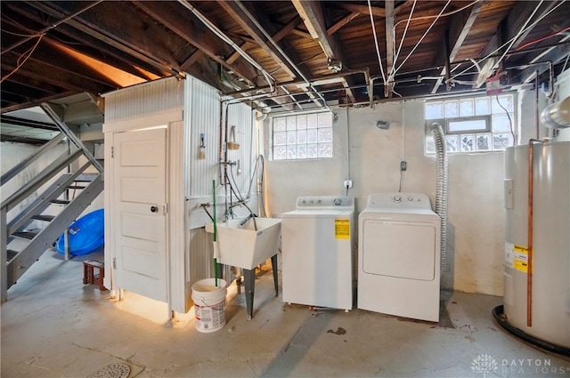 2344 Quatman Ave, Norwood, OH 45212 - below grade area with electric water heater, separate washer and dryer, stairs, and plenty of natural light