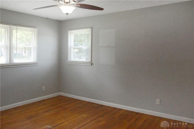 400 S Hayden Ave, Riverside, OH 45431 - spare room featuring a ceiling fan, plenty of natural light, and dark wood-style flooring