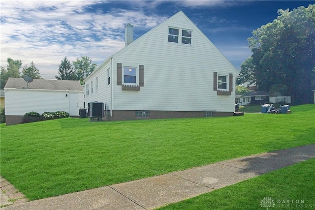 400 S Hayden Ave, Riverside, OH 45431 - view of side of property with a yard and a chimney