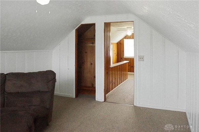400 S Hayden Ave, Riverside, OH 45431 - bonus room with a textured ceiling, carpet flooring, vaulted ceiling, and a decorative wall