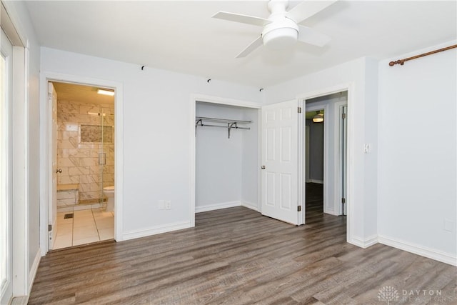 4155 Eckworth, Bellbrook, OH 45305 - unfurnished bedroom featuring wood finished floors, a closet, ensuite bath, and a ceiling fan