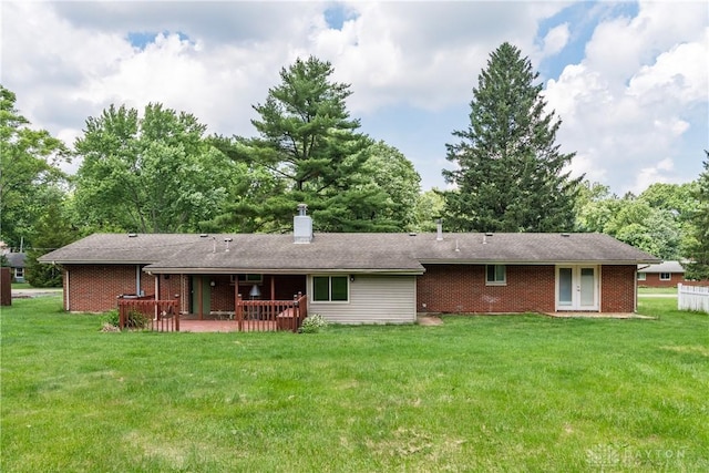 4155 Eckworth, Bellbrook, OH 45305 - rear view of house featuring a patio, a lawn, brick siding, and a chimney