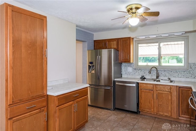 4155 Eckworth, Bellbrook, OH 45305 - kitchen with appliances with stainless steel finishes, light countertops, a ceiling fan, and brown cabinetry