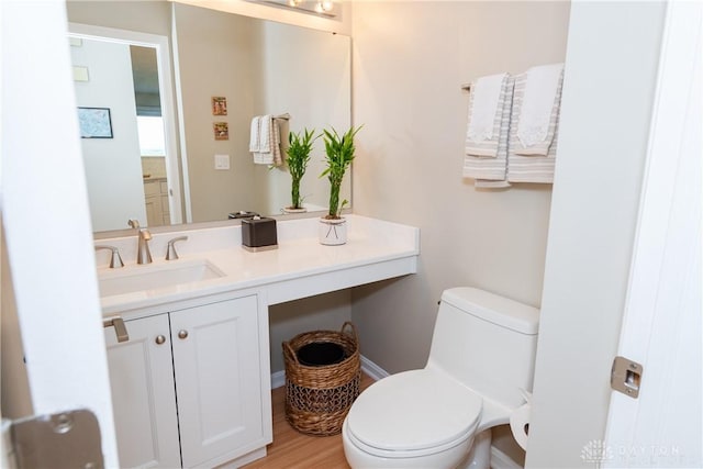 3917 E Summit Ridge Dr, Beavercreek, OH 45430 - half bath featuring vanity and wood finished floors