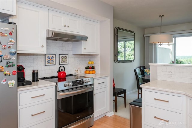 3917 E Summit Ridge Dr, Beavercreek, OH 45430 - kitchen with appliances with stainless steel finishes, under cabinet range hood, healthy amount of natural light, and white cabinetry