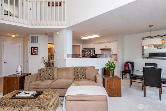 3917 E Summit Ridge Dr, Beavercreek, OH 45430 - living room with light carpet and a high ceiling