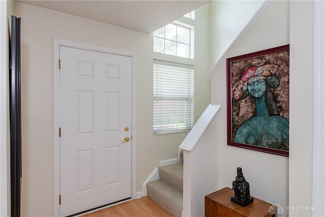 3917 E Summit Ridge Dr, Beavercreek, OH 45430 - foyer with light wood-type flooring and stairs
