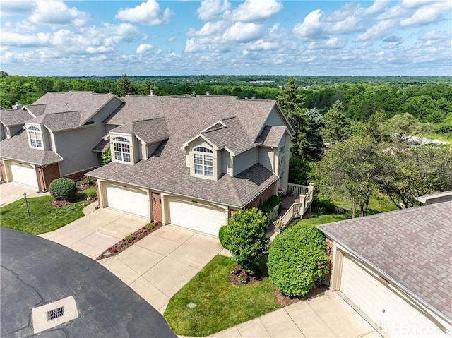 3917 E Summit Ridge Dr, Beavercreek, OH 45430 - aerial view of property and surrounding area with a forest