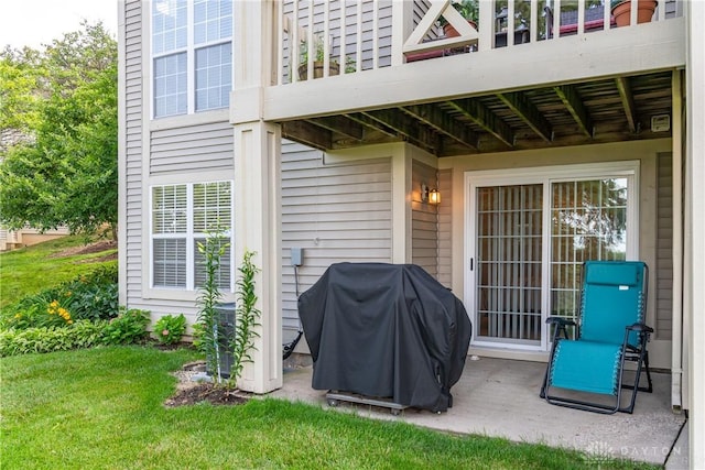 3917 E Summit Ridge Dr, Beavercreek, OH 45430 - patio / terrace with grilling area, a lawn, and a patio area
