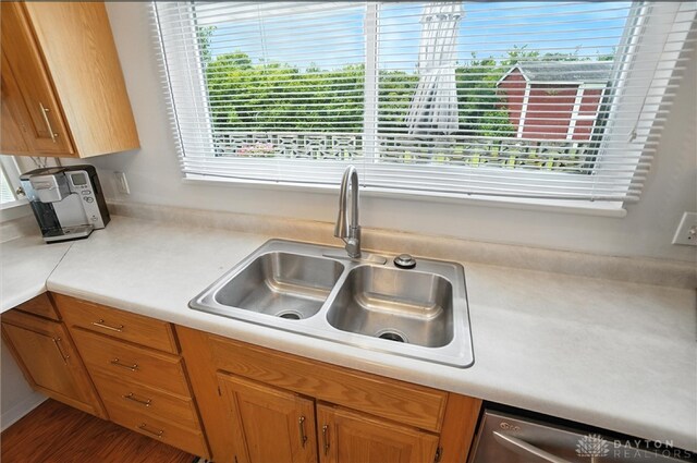 903 Meadow Ln, Lebanon, OH 45036 - kitchen with dishwasher, light countertops, and wood finished floors