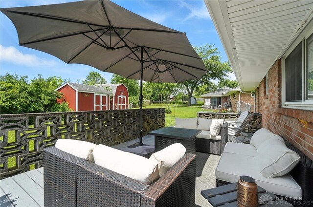 903 Meadow Ln, Lebanon, OH 45036 - wooden deck featuring an outdoor hangout area and a storage unit