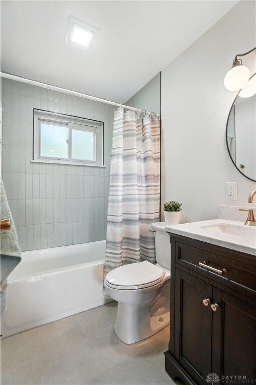 1023 Hilliard Dr, Delhi Twp, OH 45238 - full bath featuring vanity and shower / bath combo