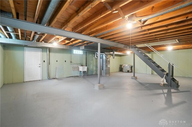 1023 Hilliard Dr, Delhi Twp, OH 45238 - basement with stairway and heating unit