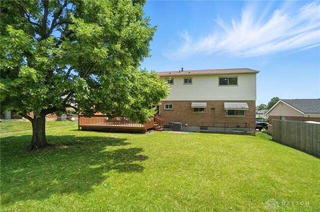 1023 Hilliard Dr, Delhi Twp, OH 45238 - rear view of property featuring a wooden deck