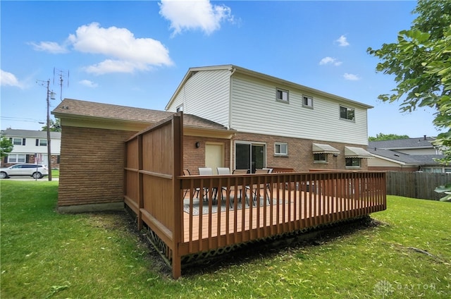 1023 Hilliard Dr, Delhi Twp, OH 45238 - rear view of house with brick siding and a deck