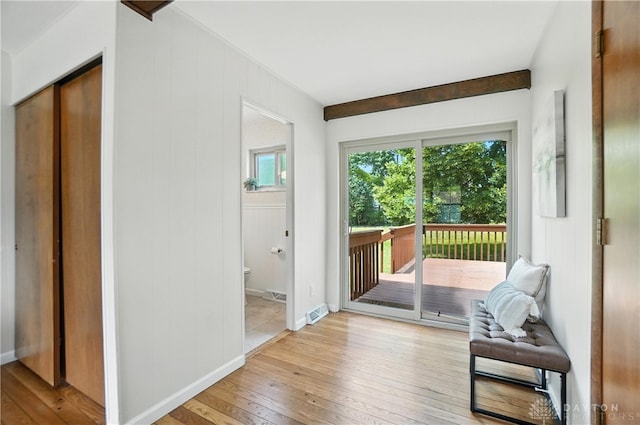 1023 Hilliard Dr, Delhi Twp, OH 45238 - doorway to outside featuring light wood-style floors and baseboards