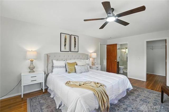 1023 Hilliard Dr, Delhi Twp, OH 45238 - bedroom featuring wood finished floors, a spacious closet, ensuite bath, and ceiling fan