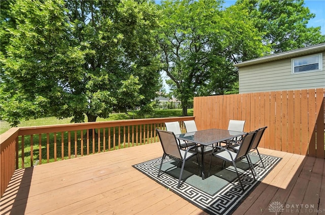 1023 Hilliard Dr, Delhi Twp, OH 45238 - wooden deck featuring outdoor dining area