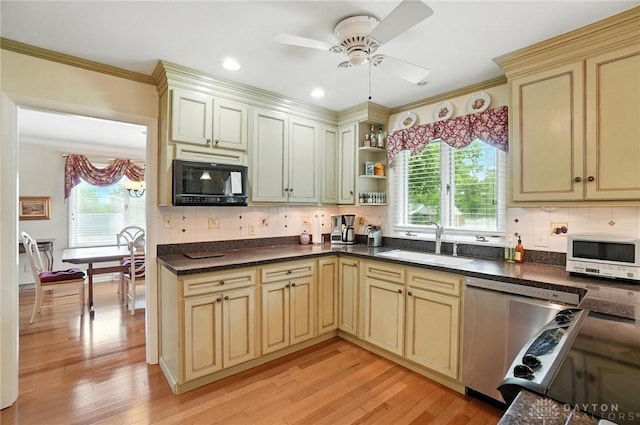 1804 Schirm Dr, Middletown, OH 45042 - kitchen with cream cabinets, dishwasher, black microwave, a ceiling fan, and dark countertops