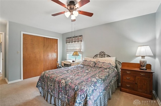 1804 Schirm Dr, Middletown, OH 45042 - bedroom featuring light carpet, a closet, and ceiling fan