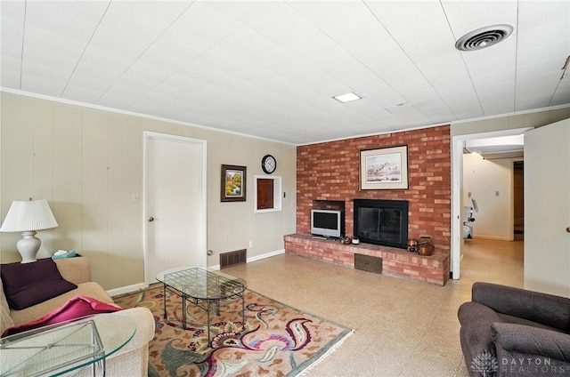 1804 Schirm Dr, Middletown, OH 45042 - living room with a fireplace, tile patterned floors, and crown molding