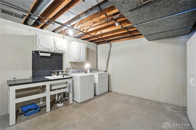 1804 Schirm Dr, Middletown, OH 45042 - laundry room with cabinet space and washing machine and clothes dryer