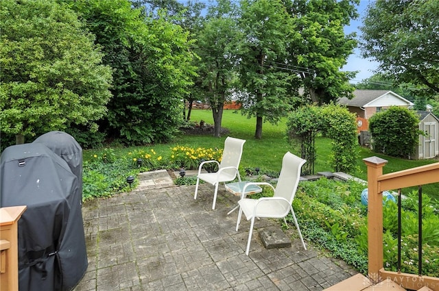 1804 Schirm Dr, Middletown, OH 45042 - view of patio / terrace featuring a grill and a storage shed