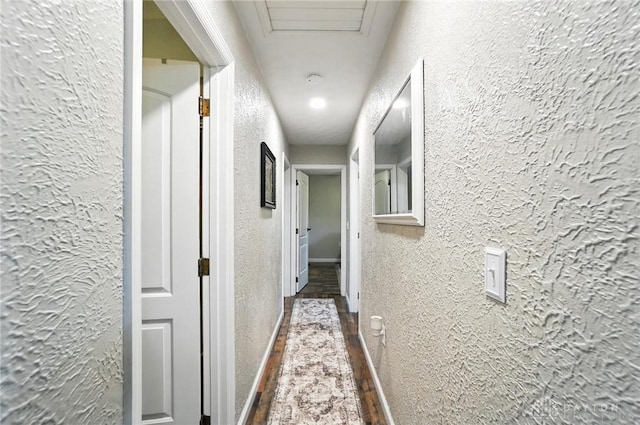 8425 Dillman Rd, Camden, OH 45311 - hall with a textured wall and attic access