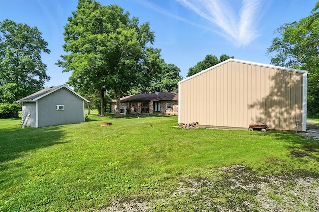 8425 Dillman Rd, Camden, OH 45311 - view of green lawn featuring an outdoor structure