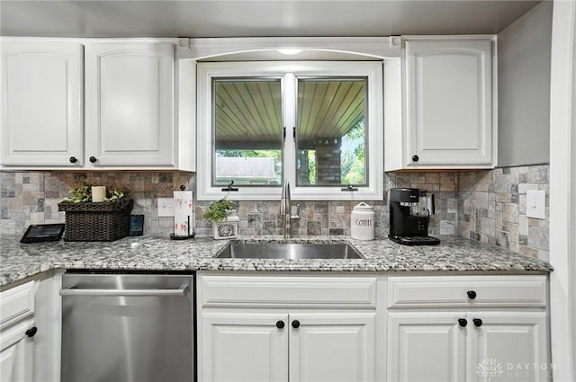 8425 Dillman Rd, Camden, OH 45311 - kitchen featuring dishwasher, tasteful backsplash, white cabinets, and light stone countertops