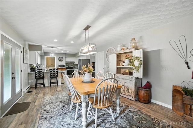 8425 Dillman Rd, Camden, OH 45311 - dining space featuring wood finished floors, recessed lighting, and french doors