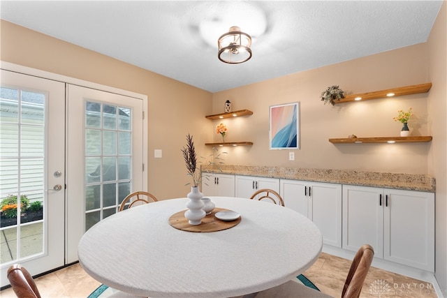 3116 Bromley Pl, Kettering, OH 45420 - dining area with light tile patterned flooring and french doors