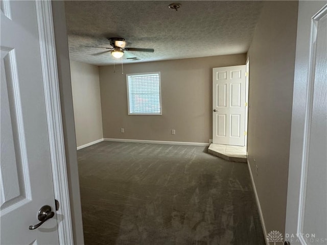 523 Newport Rd, Xenia, OH 45385 - unfurnished room with carpet flooring, a ceiling fan, a textured ceiling, and fire sprinkler in ceiling
