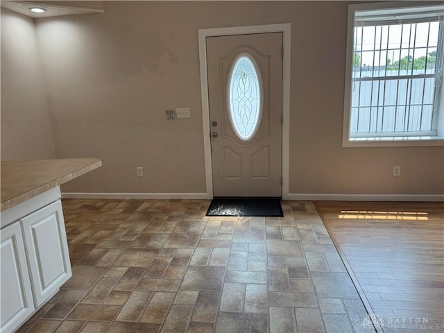 523 Newport Rd, Xenia, OH 45385 - foyer with baseboards and brick patterned floors