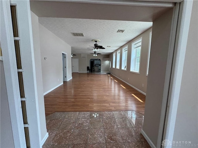 523 Newport Rd, Xenia, OH 45385 - corridor featuring baseboards and a textured ceiling