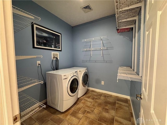 523 Newport Rd, Xenia, OH 45385 - laundry area with washer and dryer and baseboards