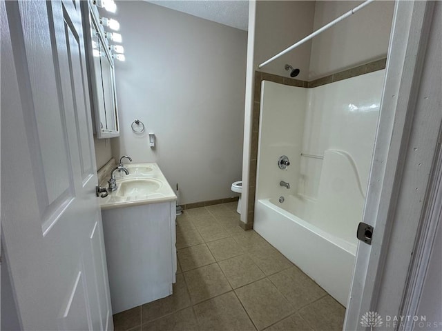 523 Newport Rd, Xenia, OH 45385 - full bath with tile patterned floors, double vanity, and shower / tub combination