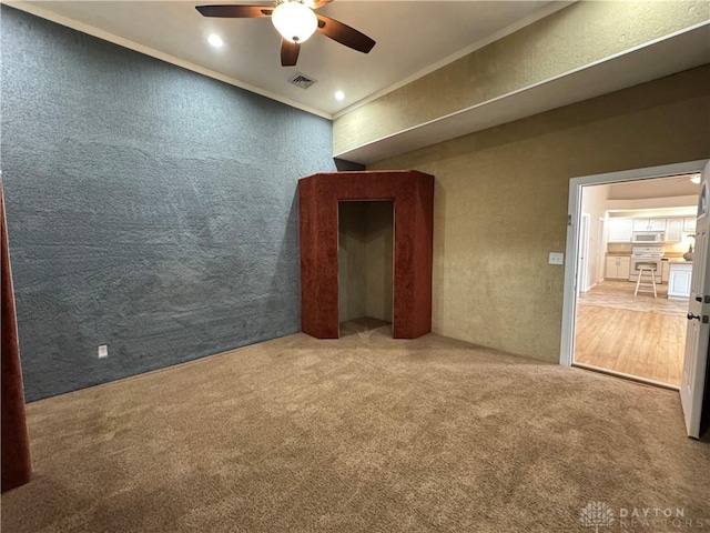 523 Newport Rd, Xenia, OH 45385 - spare room featuring ceiling fan, crown molding, carpet flooring, a textured wall, and recessed lighting