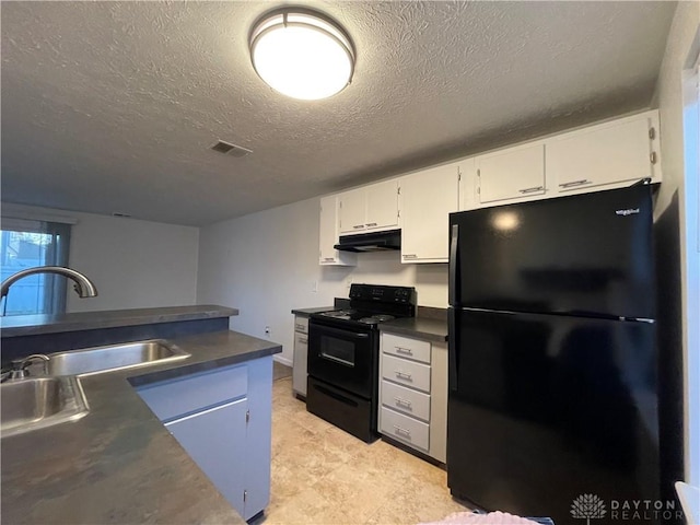 2133 Chapel Dr, Fairborn, OH 45324 - kitchen with black appliances, dark countertops, under cabinet range hood, a textured ceiling, and white cabinets