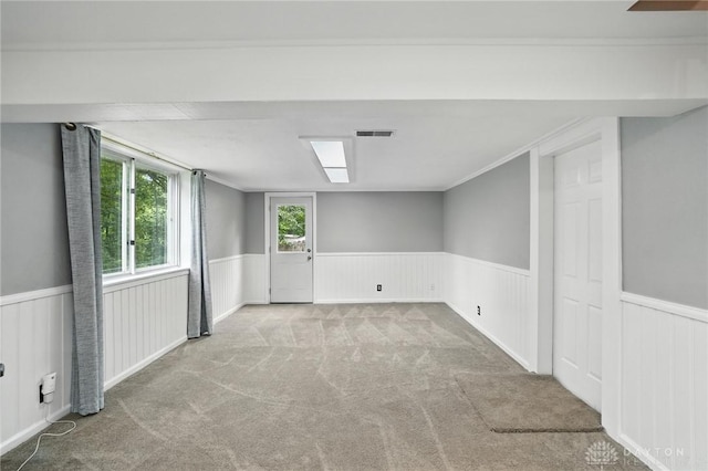 945 Oakland Dr, Beavercreek Twp, OH 45434 - carpeted empty room with wainscoting