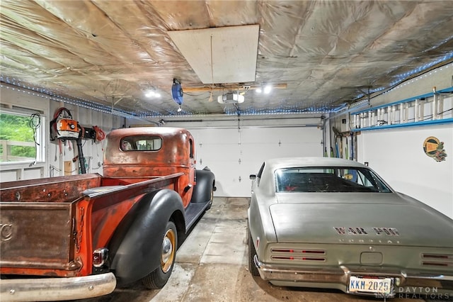 945 Oakland Dr, Beavercreek Twp, OH 45434 - garage featuring a garage door opener