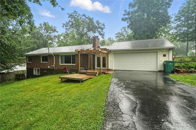 945 Oakland Dr, Beavercreek Twp, OH 45434 - ranch-style house featuring asphalt driveway, a pergola, a chimney, a garage, and a wooden deck