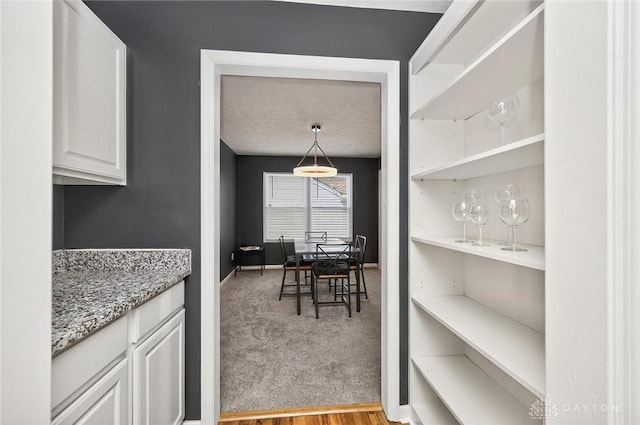 2858 Willow Ridge Dr, Colerain Twp, OH 45251 - dining room with light carpet and a textured ceiling
