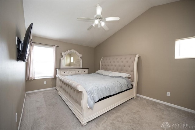 2858 Willow Ridge Dr, Colerain Twp, OH 45251 - bedroom featuring lofted ceiling, multiple windows, carpet, and a ceiling fan