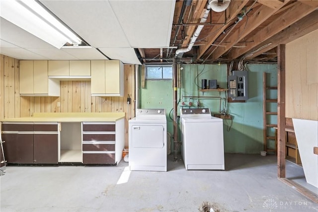 1513 Arrowhead Trl, Xenia, OH 45385 - below grade area with electric panel, independent washer and dryer, and wooden walls