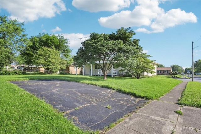1513 Arrowhead Trl, Xenia, OH 45385 - view of community featuring a yard