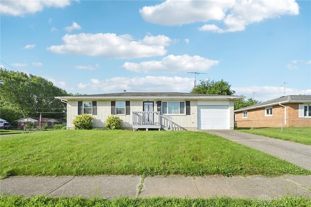 1513 Arrowhead Trl, Xenia, OH 45385 - ranch-style house with an attached garage, driveway, and brick siding