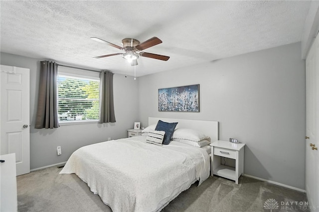 1424 Hillary Ln, Mason, OH 45040 - bedroom with carpet, a textured ceiling, and a ceiling fan